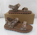 Coach Brynn sandals featuring a crystal signature