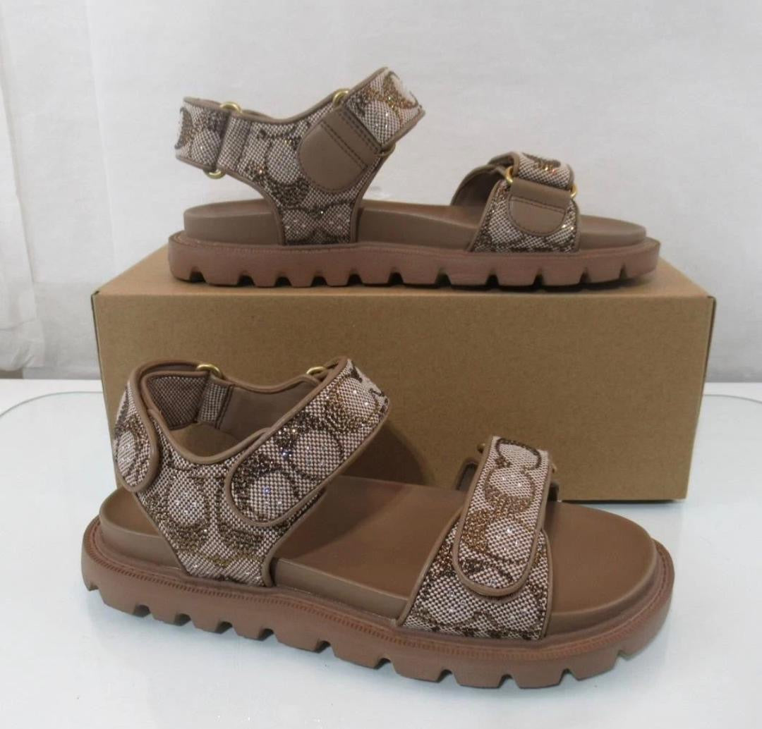 Coach Brynn sandals featuring a crystal signature