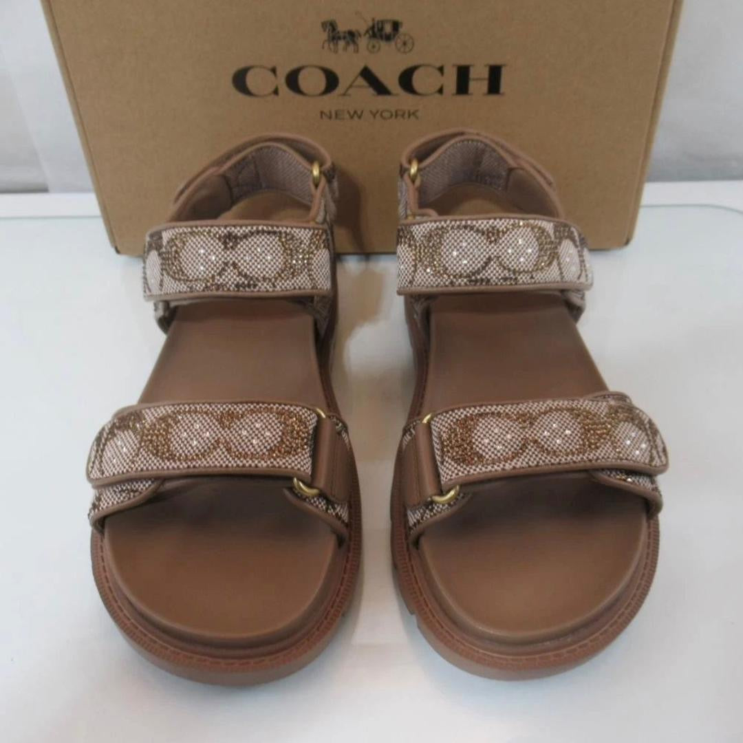 Coach Brynn sandals featuring a crystal signature