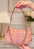Teri coach beaded bag