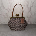 coach Kisslock 16 signature crystal jacquard bag.
