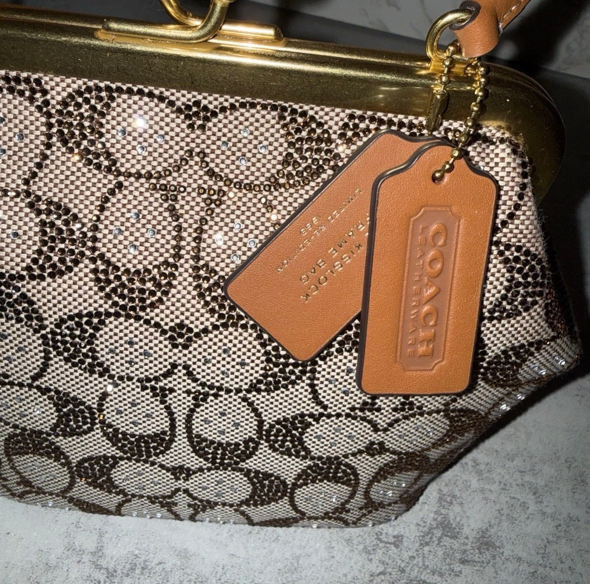 coach Kisslock 16 signature crystal jacquard bag.