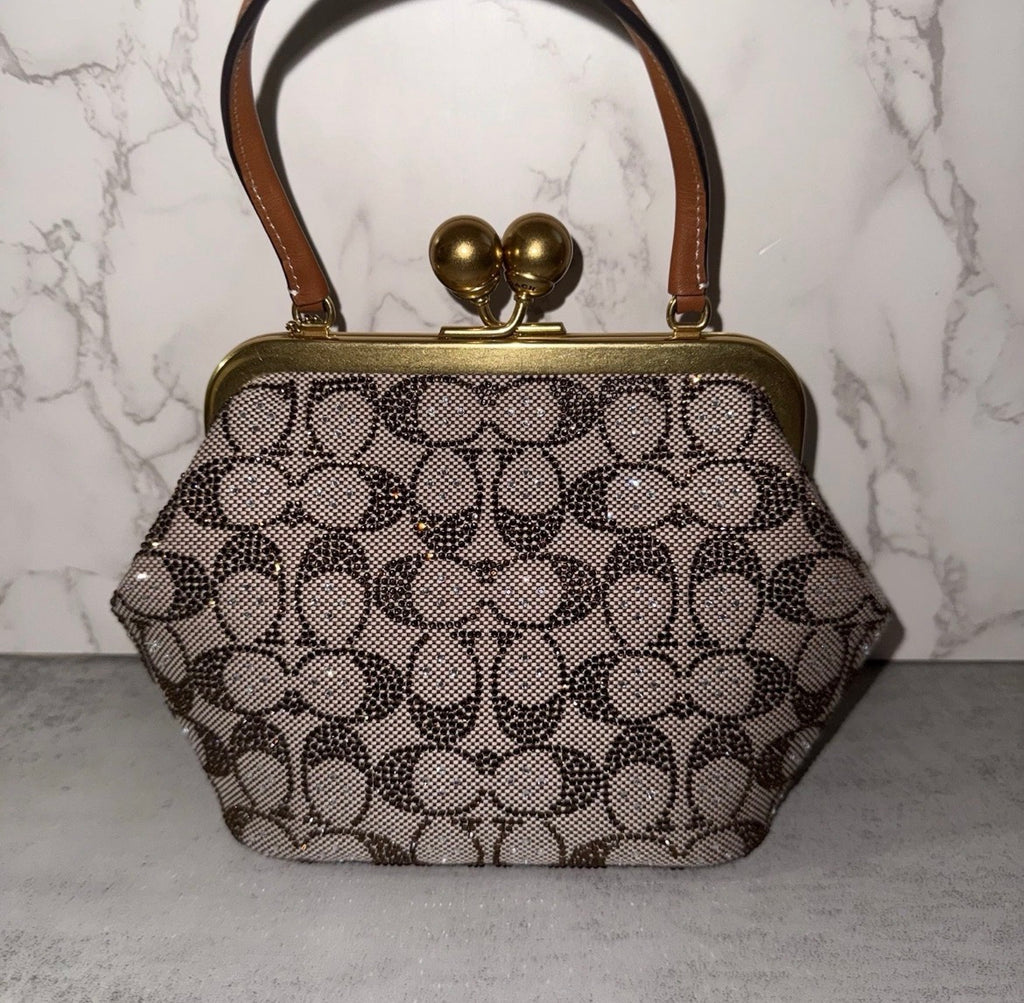 coach Kisslock 16 signature crystal jacquard bag.