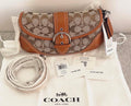 COACH Soho Bag 25 in Crystal Signature Jacquard with burnished amber leather trim.